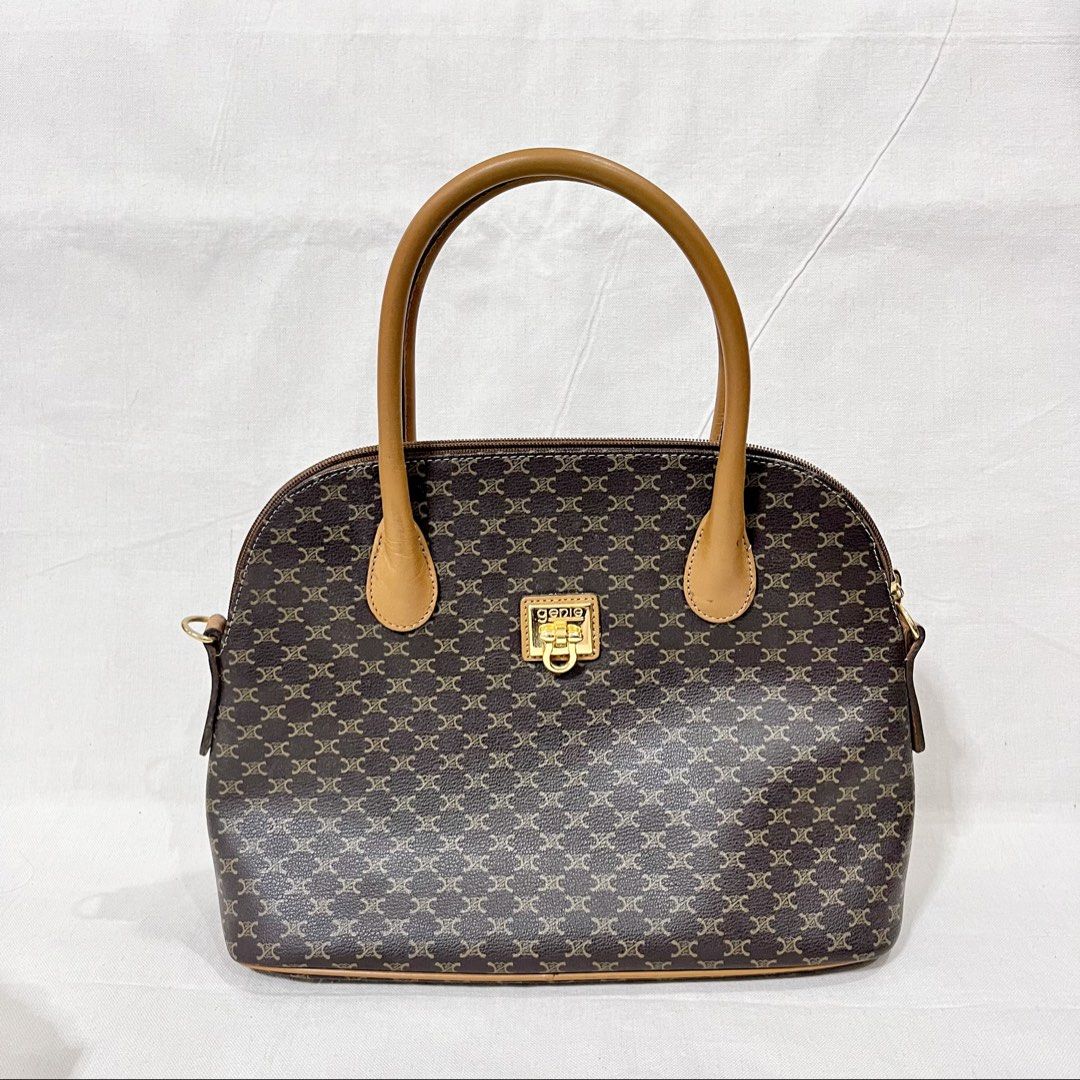 Genie Brown Monogram Polyvinyl Material Handbag (Category: Shoulder Bags) located in Antipolo. Submitted by aristokai (Listing ID 1471180965, Image 1). Description: ✅ NOTE: NO LONG STRAP ✅ Like new and in good condition! .