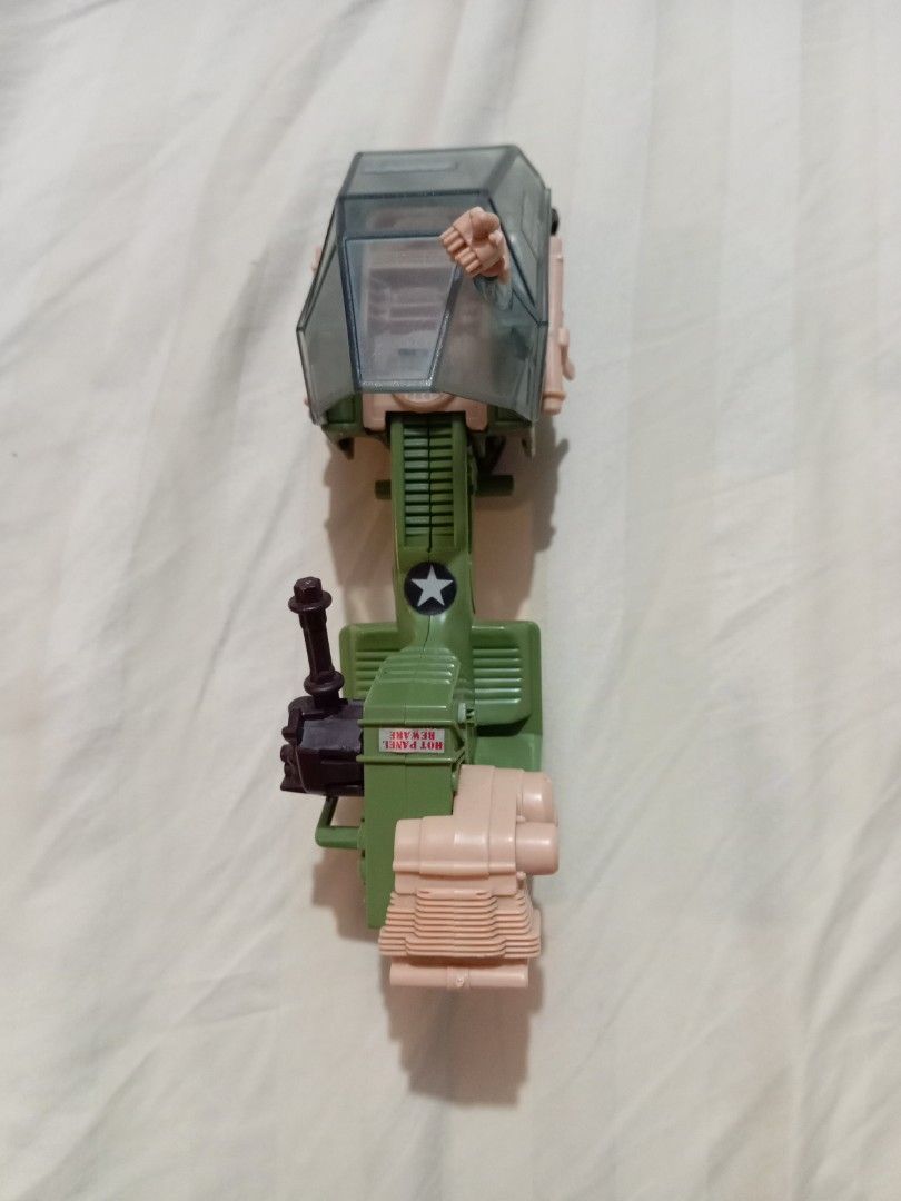Gi Joe LCV Recon Sled (Category: Vehicle & Diecast Models) located in Manila. Submitted by johnhunte48138 (Listing ID 1471192209, Image 3). Description: - Green plastic military vehicle toy - Features 'United States' lettering and clear cockpit windshield - Includes brown gun turret and tan engine details - Designed with a single front wheel and rear track cluster - Perfect collectible piece for military vehicle fans - Condition: Brand new/Good a