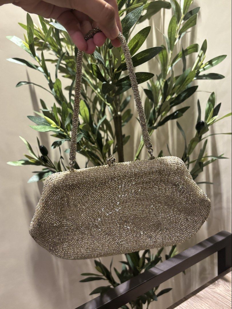 Gold Bedazzled Beaded Purse Mini bag (Category: Purses & Pouches) located in Quezon City. Submitted by shop_abo (Listing ID 1471256719, Image 1). Description: condition rate: 9/10 needs a bit of cleaning inside:)).