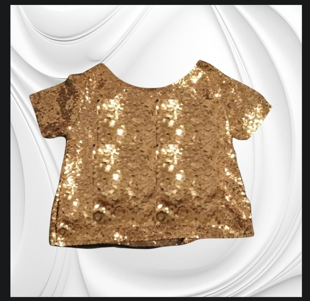Gold Sequin T-Shirt with Evil Eye Graphic (Category: Shirts) located in Paranaque City. Submitted by calm_youngstore7 (Listing ID 1471245159, Image 2). Description: - Stunning gold sequin short-sleeve top - Features a large beaded evil eye design with black & white details and dangling teardrops - Plain gold sequins on the back - Stylish black trim on the crew neck and sleeves - Fully covered in shiny, eye-catching sequins - Condition: Brand new 