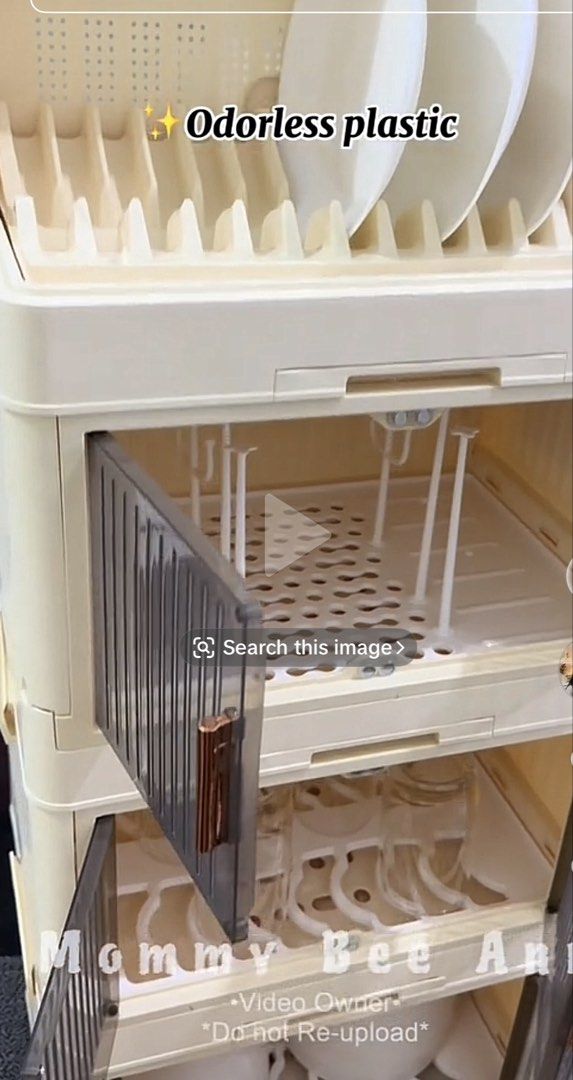 Good Green Life 3 Layers Kitchen Dish Rack (Category: Food Organization & Storage) located in Quezon City. Submitted by ysm_shoppe (Listing ID 1471262552, Image 3). Description: - Space-saving vertical design ideal for kitchen countertops - Elegant cream finish with stylish bronze-toned handles - Clear flip doors and top cover to keep your dishes dust-free - Multi-tier interior storage for plates, bowls, cups, and utensils - Includes convenient s