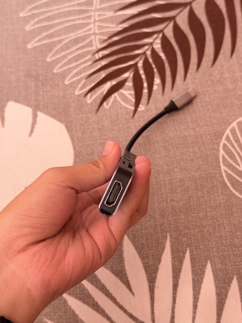 GOOJODOQ Multi-Port USB-C Hub Adapter (Category: Cables & Adaptors) located in Munoz. Submitted by shop.holiic (Listing ID 1471130996, Image 3). Description: - Brand: GOOJODOQ - Color: Grey - Condition: Barely used, works great - Ports: USB-A, USB-C, Card Reader, and HDMI - Connection: Attached Type-C cable - Compatibility: Great for laptops and tablets Not using anymore Still working MOP: Gcash/Maribank Nueva Ecija .