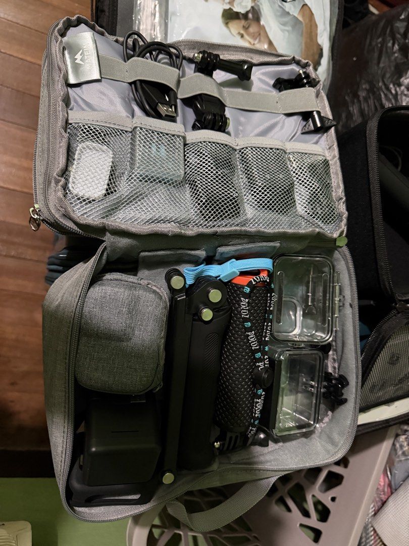 GoPro action camera bundle with accessories and case (Category: Cameras) located in Manila. Submitted by adanielbm (Listing ID 1471134714, Image 3). Description: GoPro12 Black creator Edition - Complete GoPro setup for all your content creation needs - Includes Volta battery grip, Media Mod, Light Mod, and Max Lens Mod 2.0 - Comes with waterproof protective housings, sturdy tripod, and multiple versatile mounts - Includes USB cables and a spaciou