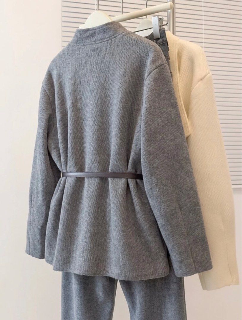 Grey Woolen Coat Jacket With Belt (Category: Coats, Jackets and Outerwear) located in Cagayan de Oro. Submitted by tinp17 (Listing ID 1471164682, Image 3). Description: - Color: Grey - Material: Soft textured wool-blend outer with smooth inner lining - Design: Open front with a chic wide lapel collar and long sleeves - Detail: Includes a thin brown faux leather waist belt for a flattering fit - Styling: Perfect for layering over basic tops and sw
