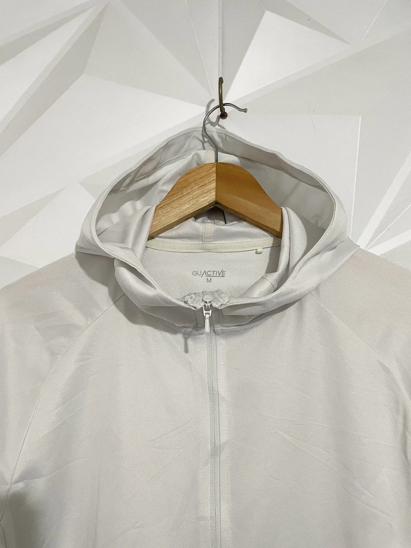 GU Active White Zip-Up Hoodie Jacket Size M (Category: Coats, Jackets and Outerwear) located in Cabuyao City. Submitted by ParadisethriftedPh (Listing ID 1471291527, Image 3). Description: Cr: 9.5/10 Dimensions W: 19.5 L: 22-24 - Brand: GU Active - Style: Full-zip hoodie - Color: White - Size: M - Material: Lightweight athletic fabric - Features: Thumbholes on cuffs and front pockets - Condition: Clean inside and out, great for workouts or casual