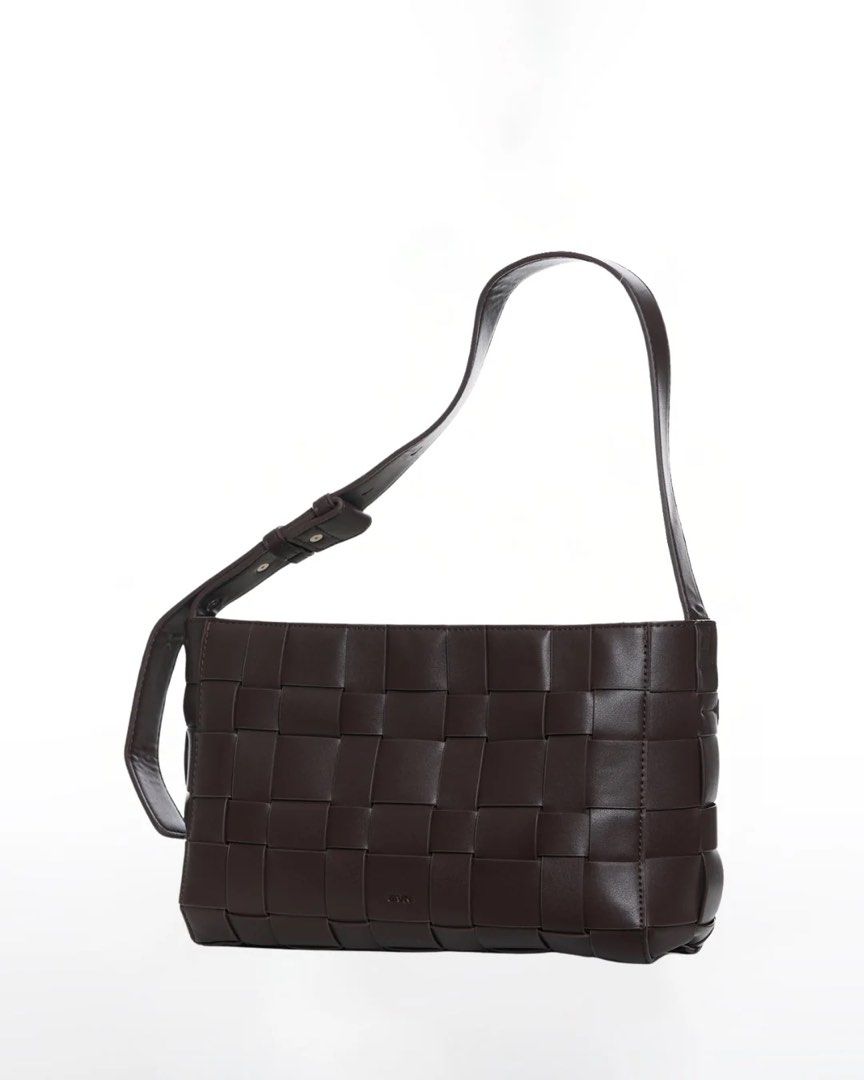 GVN Medium Woven Frame Bag in Espresso (Category: Shoulder Bags) located in Manila. Submitted by jeonsbit (Listing ID 1471228862, Image 1). Description: - Color: Dark brown / Espresso - Material: Premium leather with intricate woven grid pattern -Comes with dustbag - Design: Structured rectangular shape with clean edge stitching - Strap: Adjustable strap with metal snap fasteners - Fit: Compact and easy to carry on the shoulder or under the arm -