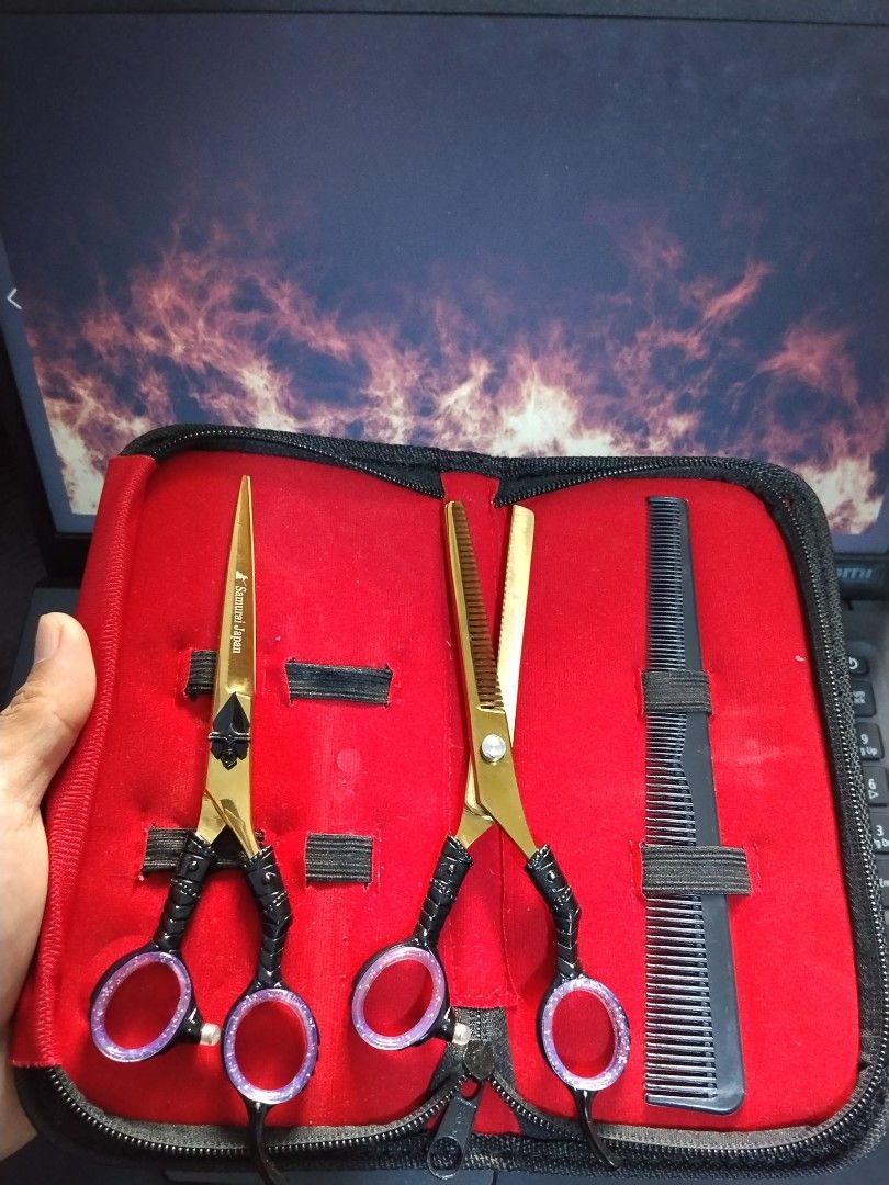Hair Cutting Scissors Thinning Shears Set with Case (Category: Hair) located in Manila. Submitted by junaid23 (Listing ID 1471174954, Image 1). Description: - Complete hair styling kit for home use or grooming practice - Includes straight scissors, thinning shears, and a black comb - Durable stainless steel construction with comfortable finger rings - Comes in a compact red zipped storage case for easy organization - Brand new and ready to use.