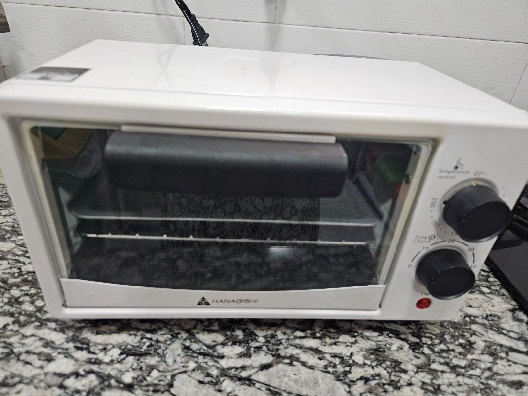 Hanabishi Electric Toaster Oven White (Category: Ovens & Toasters) located in Tanza. Submitted by mama_1996sagi (Listing ID 1471197579, Image 1). Description: Brand/Model: Hanabishi White Toaster Oven - Condition: Clean, well-maintained, and 100% working - Space-Saving: Compact design, ideal for small kitchens, dorms, or offices - Controls: Easy-to-use double knobs on the right for precise temperature and timer settings - Inclusions: Comes with a
