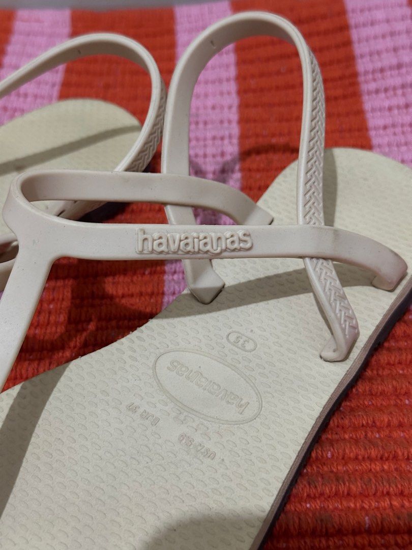Havaianas Sandals Size 5 (Category: Flats & Sandals) located in Antipolo. Submitted by wxyz9876 (Listing ID 1471124949, Image 2). Description: - Brand: Havaianas - Color: Classic Beige - Size: 5 (EU 35/36 as per sole imprint) - Design: Slingback strap for a secure fit with signature embossed logo - Comfort: Super lightweight with the classic textured rice pattern footbed - Condition: Great for casual everyday wear and easy to slip on.