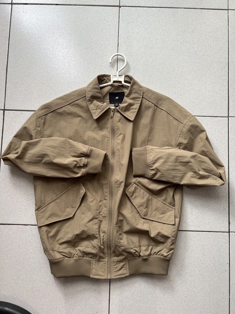 H&M Khaki Harrington Jacket Size XS (Category: Coats, Jackets and Outerwear) located in Manila. Submitted by raypeppa (Listing ID 1471149730, Image 1). Description: - SRP: 2490 PHP - Selling for only 1800 - Used Once - Brand: H&M - Color: Khaki beige - Size: Extra Small (XS) - Chest width: ~20 inches -Length ~25 inches - Features: Full zip front, lapel collar, ribbed hem & cuffs, dual front flap pockets - Condition: Clean, hardly worn.