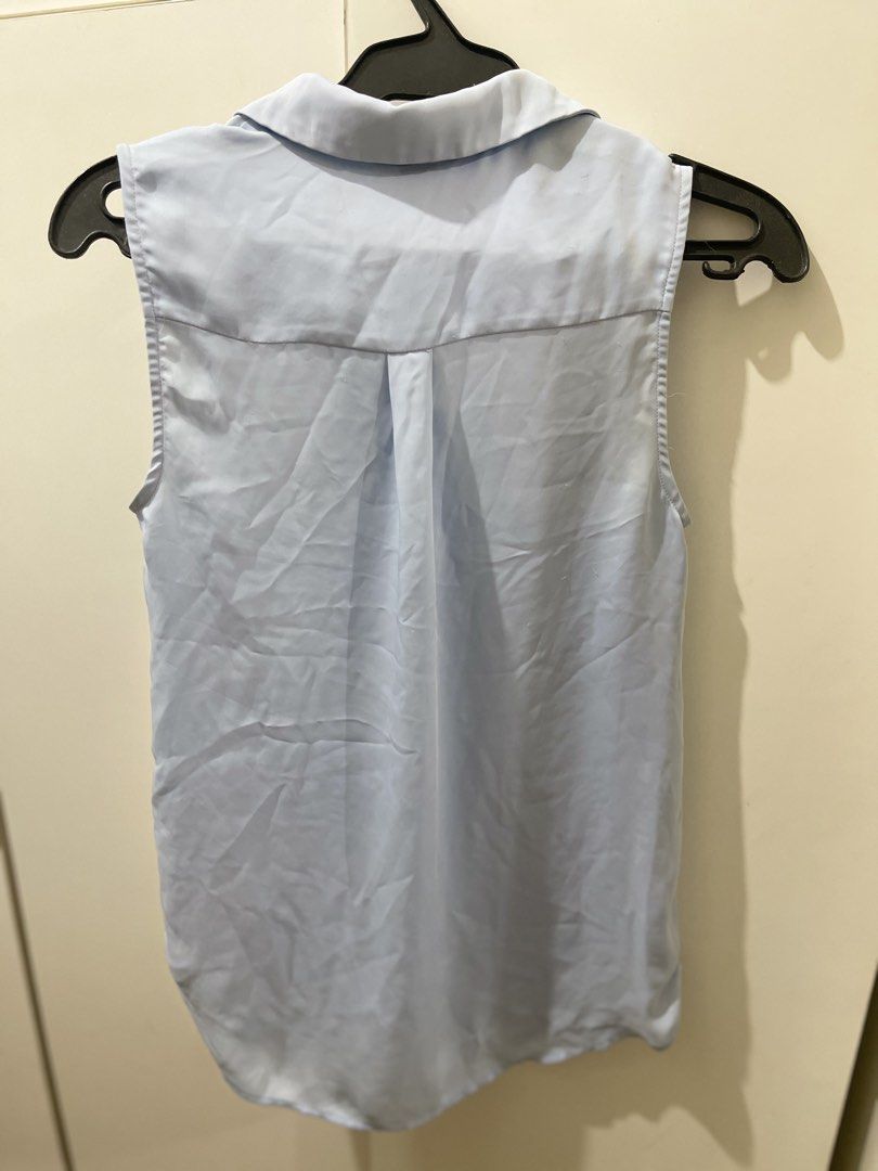 H&M Light Blue Sleeveless Button-Up Blouse (Category: Sleeveless) located in Manila. Submitted by aera_song (Listing ID 1471214399, Image 3). Description: .