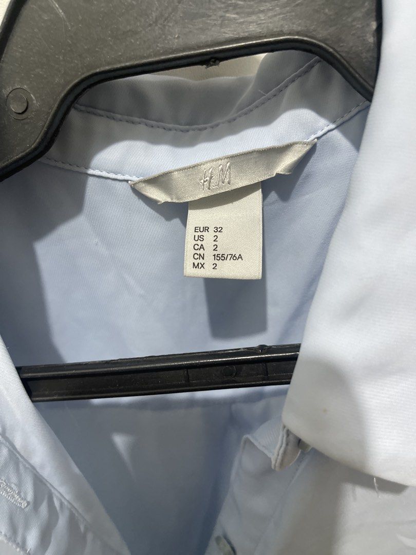 H&M Light Blue Sleeveless Button-Up Blouse (Category: Sleeveless) located in Manila. Submitted by aera_song (Listing ID 1471214399, Image 2). Description: .