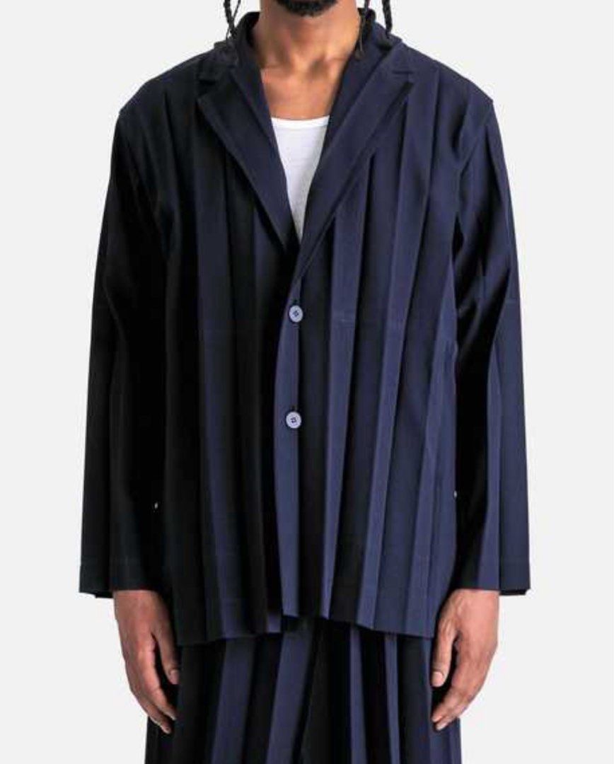 HOMME PLISSE - ISSEY MIYAKE EDGE ENSEMBLE JACKET (Category: Coats, Jackets and Outerwear) located in Cavite. Submitted by ___layern0ne (Listing ID 1471248167, Image 2). Description: Design & Material Features • Wide Accordion Pleats: Unlike the thinner pleats seen on standard baseline garments, the Edge Ensemble series utilizes wider, distinct architectural folds that provide a structural silhouette • Semi-Gloss Finish: The 100% technical polyest