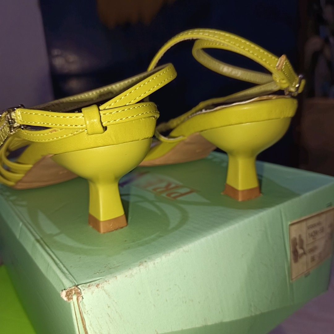 HUE Brand Lime Green Strap Heels Size 8 (Category: Heels) located in Taguig. Submitted by rrdurant (Listing ID 1471268060, Image 3). Description: - Brand: HUE - Color: Bright lime green - Size: US 8 - Style: Strappy with toe loop and ankle buckle closure - Heel: Chunky low heel - Condition: Minor wear on soles, clean uppers and insoles - Inclusions: Original box included.