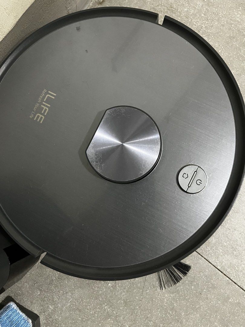 ILIFE Robot Vacuum and Mop with Auto-Empty Base (Category: Vacuum Cleaner & Housekeeping) located in Pasig City. Submitted by tomayto02 (Listing ID 1471157319, Image 1). Description: - Brand: ILIFE - Color: Dark Grey - Condition: Great working condition - Features: 2-in-1 vacuum and mop with hands-free cleaning - Dock: Automatic dust collection station with clean dust bag installed - Inclusions: Vacuum unit, side brush, and detachable mopping pad