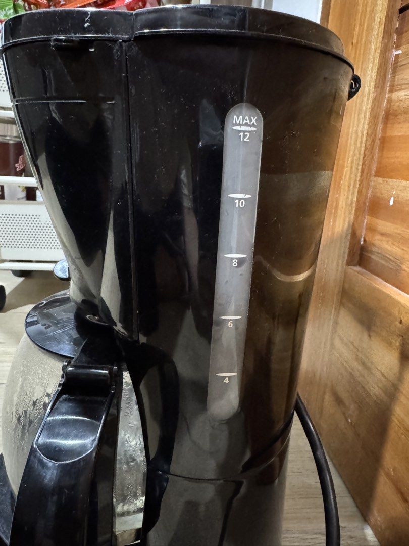 Imarflex 12-Cup Black Drip Coffee Maker (Category: Coffee Machines & Makers) located in Manila. Submitted by shijin_007 (Listing ID 1471282980, Image 2). Description: - Brand: Imarflex - Capacity: Up to 12 cups with glass carafe - Features: Clear side water level gauge (4-12 cups) and simple red power switch - Condition: Minor dust from storage, glass pot is fully intact with measurement markings - Plug: Standard plug-in cord attached - Minor iss