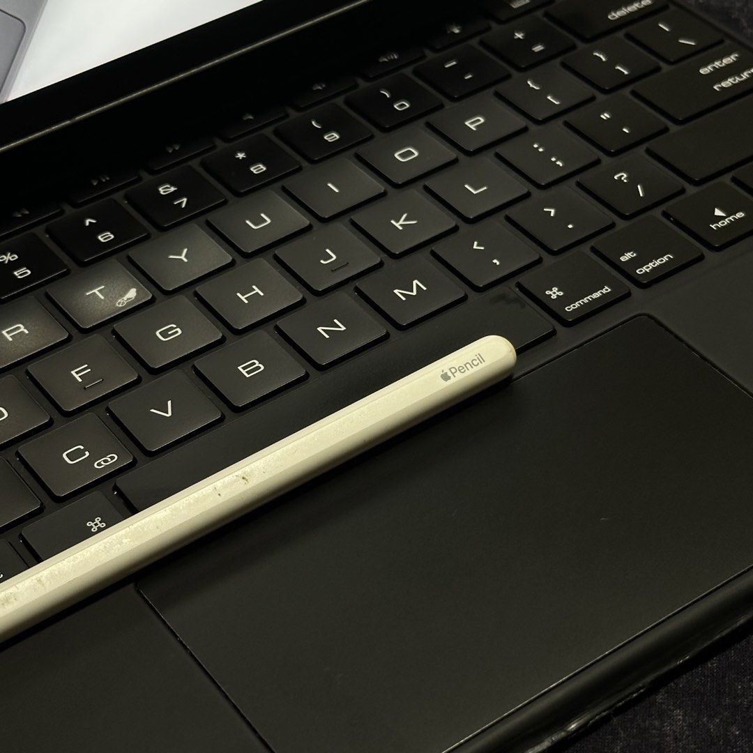 iPad Pro 4th Cellular w/ Apple Pen and Magic Keyboard (not apple) (Category: iPad) located in Manila. Submitted by yunnn7104 (Listing ID 1471226149, Image 2). Description: iPad Pro 12.9-inch 128GB (4th Gen) WiFi + Cellular (pwede lagyan sim) with Magic Keyboard (not apple) and Apple Pencil (genuine) no issue/all functions working no history of repair/all parts original updated latest iPadOS (27) working face id, true tone, etc 120hz display 33,50