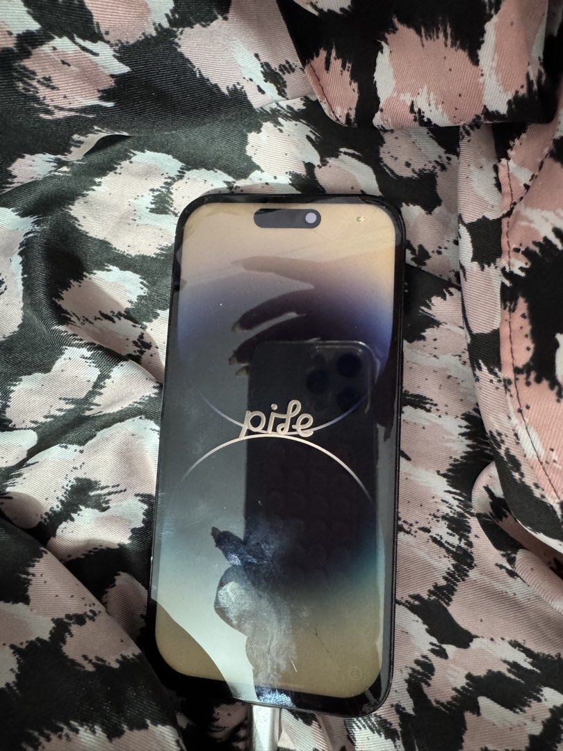 iphone 14 pro (Category: iPhone 14 Series) located in Makati City. Submitted by cosmic_nevada (Listing ID 1471260621, Image 2). Description: iphone 14 pro with box 76 battery health BROKEN LCD with light scratches message for more information 📍manila .