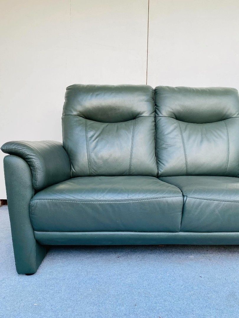 JAPAN SURPLUS" 2-SEATER HIGHBACK DARK GREEN LEATHER SOFA. (Category: Sofas) located in Bulacan. Submitted by junnie09 (Listing ID 1471181870, Image 3). Description: "JAPAN SURPLUS" 2-SEATER HIGHBACK DARK GREEN LEATHER SOFA. SIZE: 56L" x 36W" x 16Sh" x 37H" inches. (AS-IS ITEM) IN GOOD CONDITION.