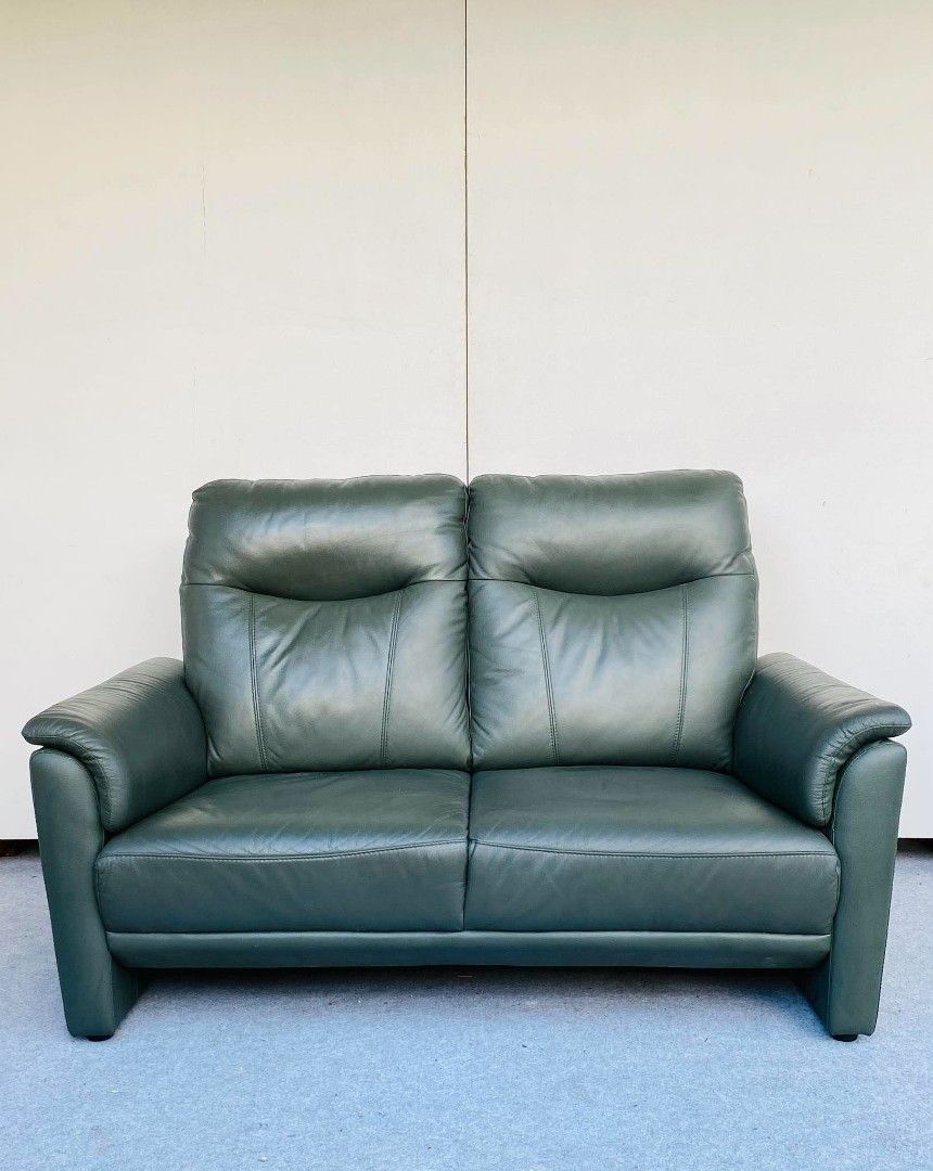 JAPAN SURPLUS" 2-SEATER HIGHBACK DARK GREEN LEATHER SOFA. (Category: Sofas) located in Bulacan. Submitted by junnie09 (Listing ID 1471181870, Image 1). Description: "JAPAN SURPLUS" 2-SEATER HIGHBACK DARK GREEN LEATHER SOFA. SIZE: 56L" x 36W" x 16Sh" x 37H" inches. (AS-IS ITEM) IN GOOD CONDITION.