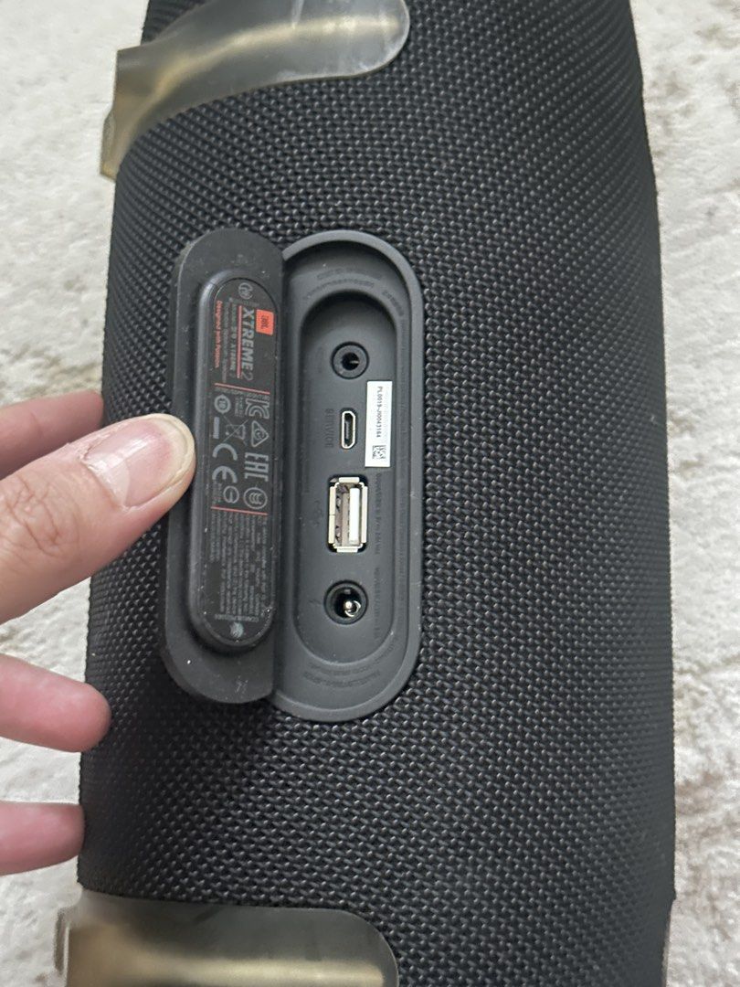 JBL Xtreme 2 Portable Bluetooth Speakers (Category: Soundbars, Speakers & Amplifiers) located in Quezon City. Submitted by lkespiritu (Listing ID 1471202717, Image 3). Description: - Model: JBL Xtreme 2 Wireless Speaker (Black) - Sound: Delivers powerful sound and deep bass - Build: Durable fabric mesh body with rugged rubber protective ends - Ports: Rear flap includes audio jack, micro USB, standard USB, and power input - Condition: Clean, well-