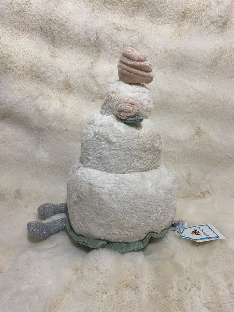 Jellycat Wedding Cake plush (Category: Plushies & Soft Toys) located in Kalibo. Submitted by ollie_stuffshop (Listing ID 1471280582, Image 2). Description: 30cm x 19cm Before you send your inquiries: ❗️Last Price is already posted ❗️Manage your expectations, WYSIWYG ❗️May need washing ❗️Dropoff is every Wednesday & Sunday.