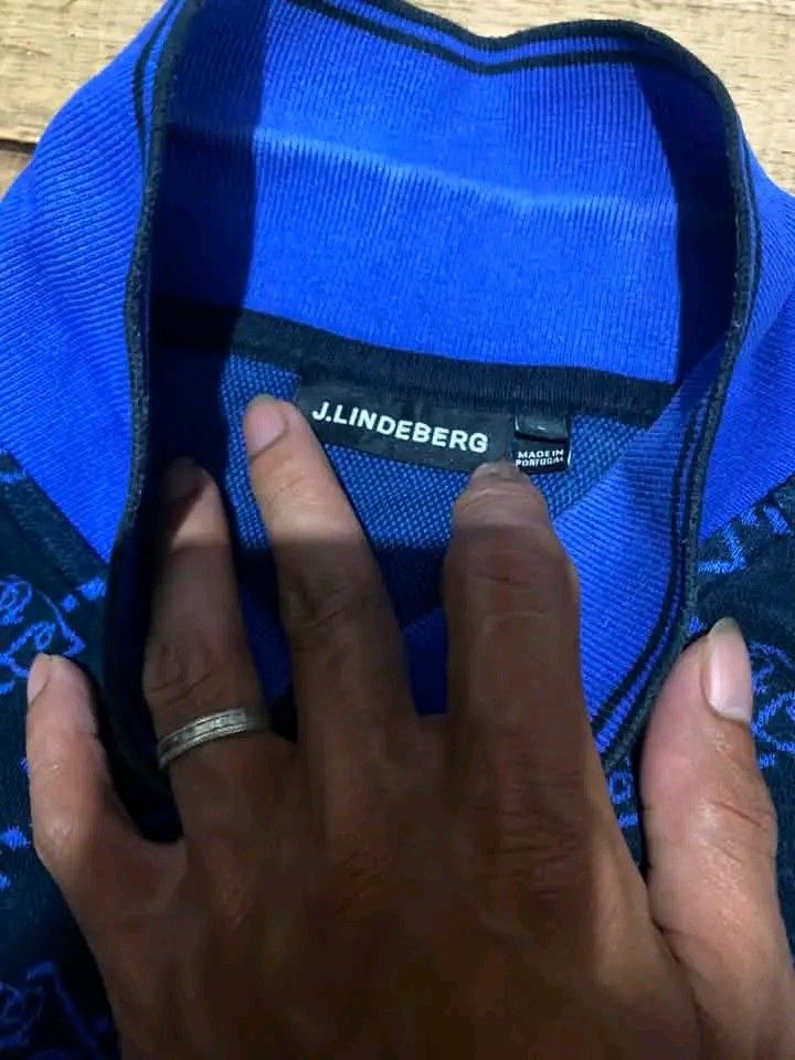 j.lindeberg AOP POLO SHIRT (Category: Luxury Apparel) located in Aurora. Submitted by originthrifting (Listing ID 1471237078, Image 2). Description: Ganda Neto guys pang personal niyo may minimal collarline lang since it on fold Siya di na makikita pag sinoot Yung line sa collar .. slight lang namn solid parin Ng piece na to.