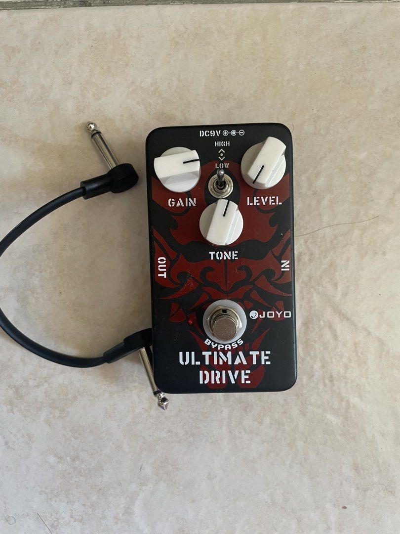 JOYO Ultimate Drive Guitar Pedal with FREE Patch Cable (Category: Musical Instruments) located in Quezon City. Submitted by ichikahenson (Listing ID 1471256787, Image 1). Description: Delivery fee is shouldered by client - Item: JOYO Ultimate Drive Guitar Effects Pedal - Condition: Used with light scuffs, 100% fully functional - Controls: Gain, Level, Tone knobs, and High/Low toggle switch - Design: Black housing with striking red demon graphic a