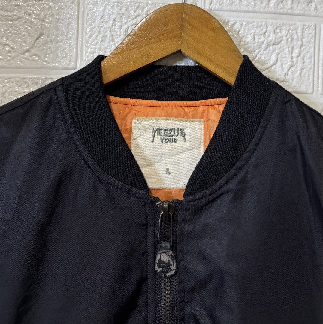 KANYE WEST YEEZUS TOUR MA-1 BOMBER JACKET (Category: Coats, Jackets and Outerwear) located in Baguio. Submitted by kds_stuffs (Listing ID 1471155286, Image 3). Description: Mine: 300 📍KANY3 W3ST "Y33ZUS TOUR" MA-1 bomber jacket 😍 Size: Large Dimension: 27L x 22W Color rate: 9/10 Issue: sinulatan nung gumamit ng marker, ituloy nyo nalang 😁😅 Very good condition Need wash Gandara neto 💗.