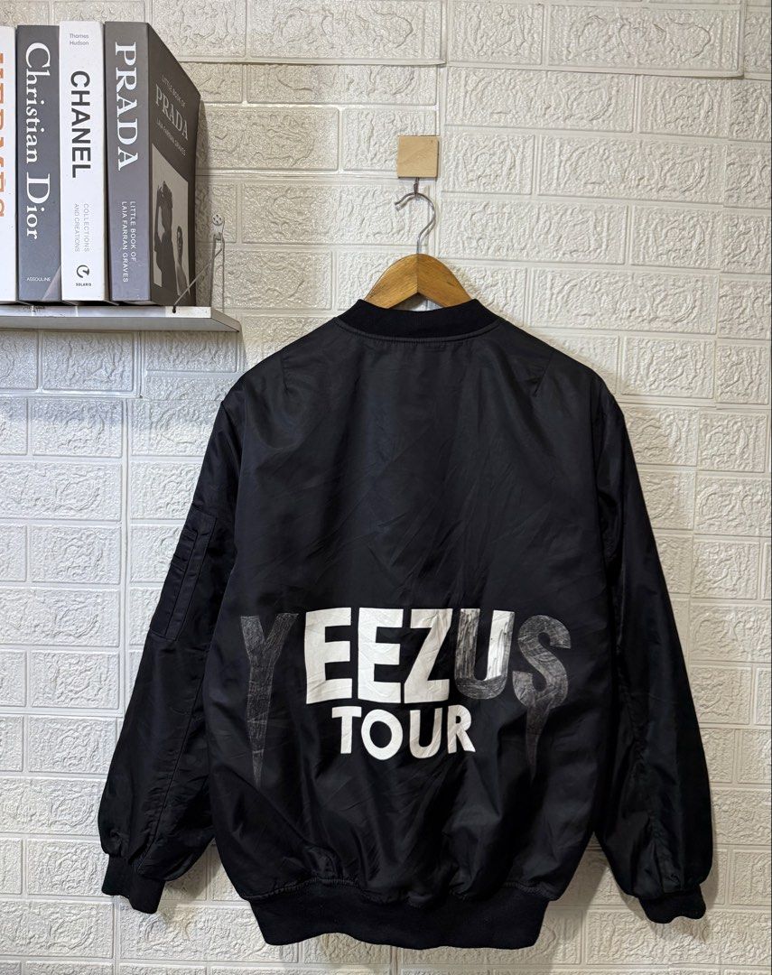 KANYE WEST YEEZUS TOUR MA-1 BOMBER JACKET (Category: Coats, Jackets and Outerwear) located in Baguio. Submitted by kds_stuffs (Listing ID 1471155286, Image 2). Description: Mine: 300 📍KANY3 W3ST "Y33ZUS TOUR" MA-1 bomber jacket 😍 Size: Large Dimension: 27L x 22W Color rate: 9/10 Issue: sinulatan nung gumamit ng marker, ituloy nyo nalang 😁😅 Very good condition Need wash Gandara neto 💗.