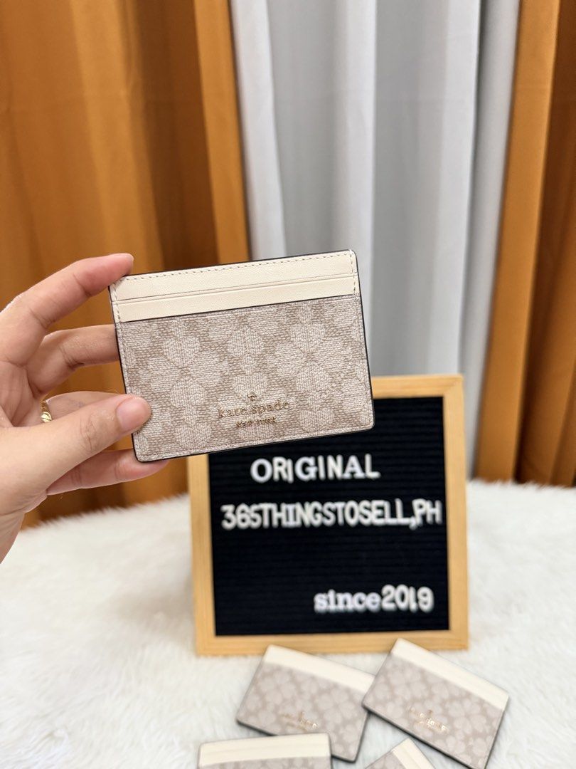 Kate spade (Category: Wallets & Card holders) located in Masantol. Submitted by 365thingstosell.ph (Listing ID 1471133392, Image 2). Description: 1,450 + sf All items are 💯Original and Brandnew Some items are no inclusions thus selling super low‼️ Ano po inclusion? Walang tag? Carecard, Etc… What you see is what you get, actual photo posted and Onhand items ready to ship. If you want full inclusions like mall or store bought, then please sa stor