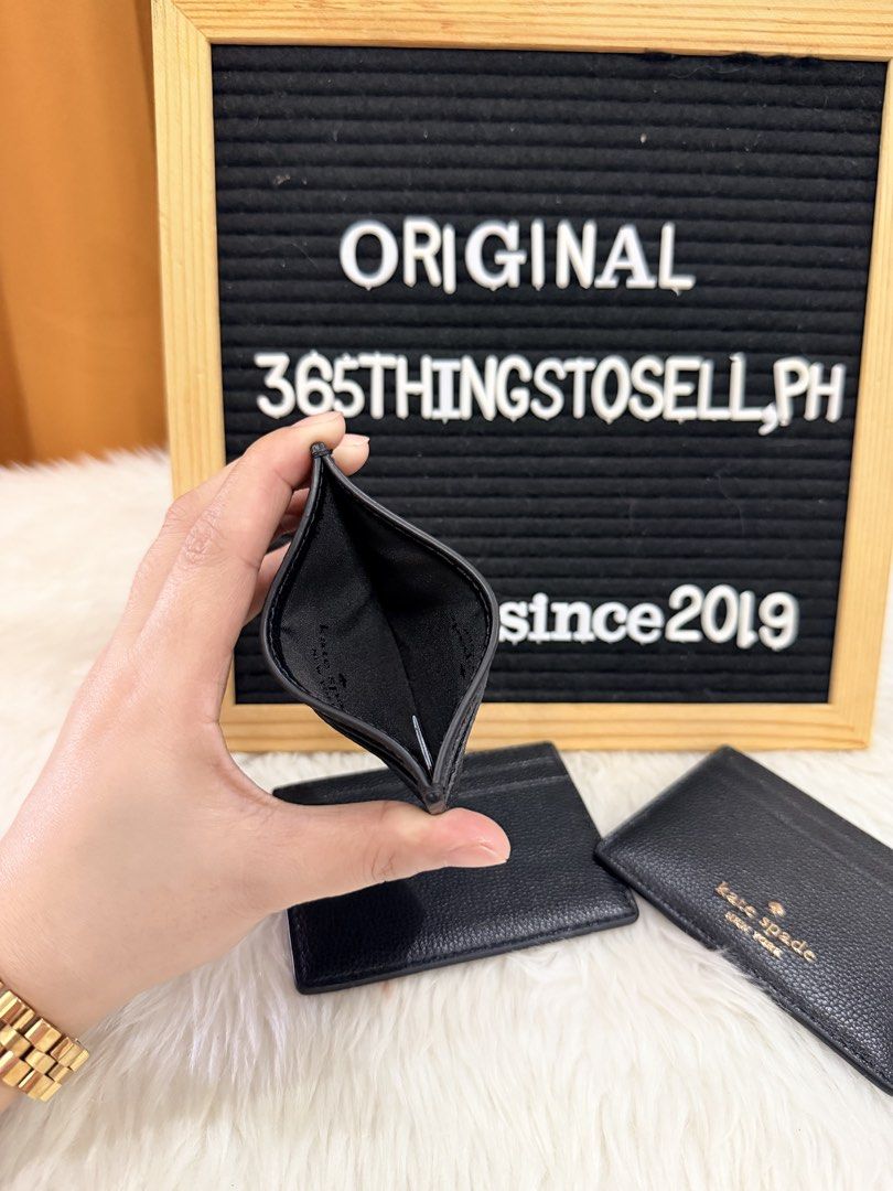 Kate Spade (Category: Wallets & Card holders) located in Masantol. Submitted by 365thingstosell.ph (Listing ID 1471133604, Image 3). Description: 1,450 + sf All items are 💯Original and Brandnew Some items are no inclusions thus selling super low‼️ Ano po inclusion? Walang tag? Carecard, Etc… What you see is what you get, actual photo posted and Onhand items ready to ship. If you want full inclusions like mall or store bought, then please sa stor