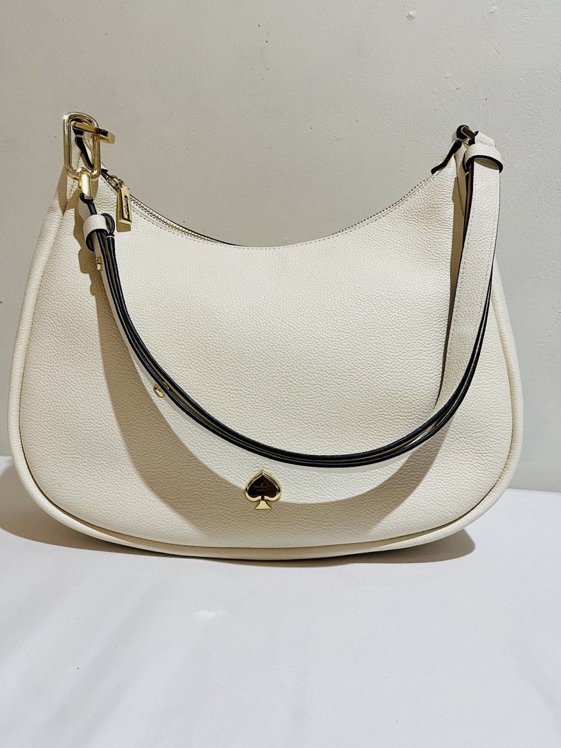 Kate Spade Kayla Large Shoulder Bag (Category: Luxury Bags & Wallets) located in Marikina City. Submitted by cafeenplus (Listing ID 1471126337, Image 3). Description: ✨ FOR SALE: KATE SPADE KAYLA LARGE SHOULDER BAG – WHITE 🤍👜 Classy, elegant, and timeless! 🤍 Perfect for everyday use or when you want to elevate your outfit. Can also be worn as a sling bag for a versatile look! ✨ Details: • Brand: Kate Spade • Model: Kayla Large Shoulder Bag • C