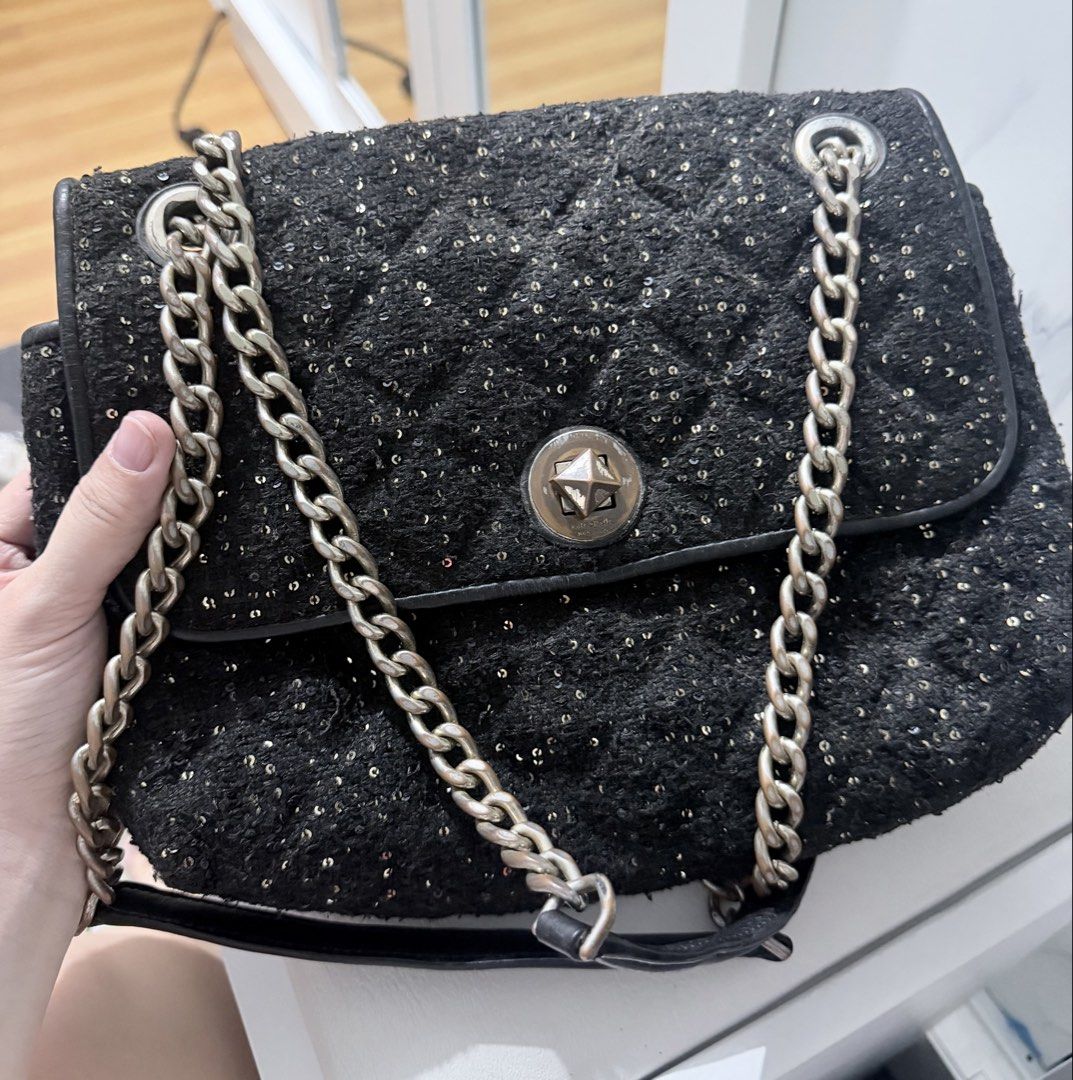 Kate Spade Natalia Sequin Tweed Medium Flap Bag (Category: Shoulder Bags) located in Manila. Submitted by prelovedbygayle (Listing ID 1471284506, Image 2). Description: • Material: Crafted from a luxury black tweed fabric woven with shimmering black and gold sequins arranged in a quilted diamond pattern. • Hardware: Equipped with a gold-tone metal turn-lock closure on the front flap, centered with a decorative domed element. • Strap Details: Outf