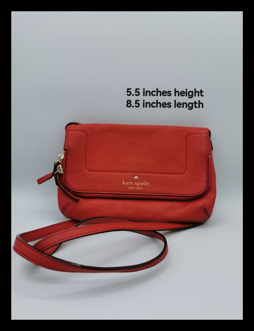Kate Spade Red Leather Crossbody Bag (Category: Cross-body Bags) located in Malabon City. Submitted by restrapped88 (Listing ID 1471271134, Image 1). Description: - Brand: Kate Spade New York - Color: Bright Red - Dimensions: 8.5" L x 5.5" H - Strap: Matching adjustable leather shoulder strap - Interior: Convenient zippered compartments - Condition: Excellent / Well-maintained.