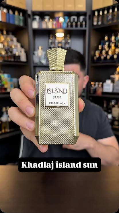Khadlaj Island Sun Perfume (Category: Fragrance & Deodorants) located in Makati City. Submitted by alexg0420 (Listing ID 1471152782, Image 3). Description: - Brand: Khadlaj Island Sun - Missing may 4-5 sprays only - Condition: Brand new, factory sealed - Packaging: Gold-colored textured box with embossed tropical leaf details - Perfect as a gift for fragrance lovers - Delivery and meetup options available.