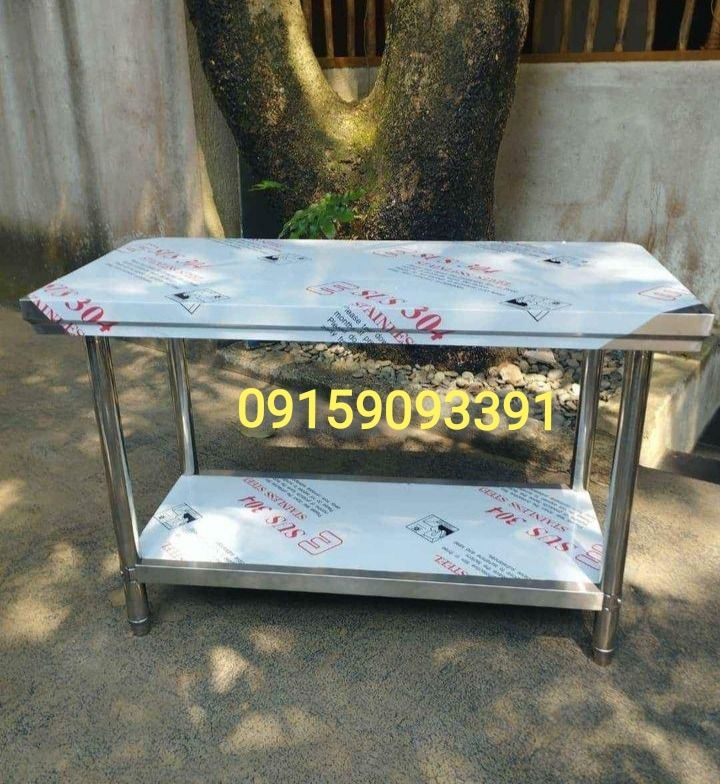 Kitchen Prep Table with Shelf (Category: Tables & Sets) located in Manila. Submitted by mayebarle006077 (Listing ID 1471136418, Image 2). Description: INDUSTRIAL TABLE Upgrade your workspace with our Industrial Table, designed to provide a sturdy, functional, and practical working surface for demanding environments. Its professional design makes it suitable for food preparation, equipment placement, and various commercial and industrial applicati