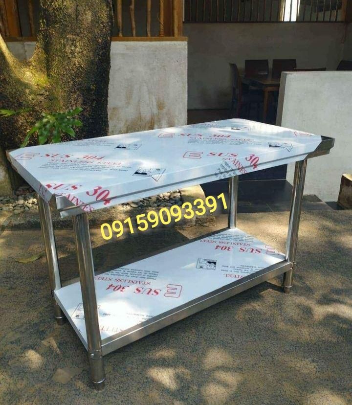 Kitchen Prep Table with Shelf (Category: Tables & Sets) located in Manila. Submitted by mayebarle006077 (Listing ID 1471136418, Image 1). Description: INDUSTRIAL TABLE Upgrade your workspace with our Industrial Table, designed to provide a sturdy, functional, and practical working surface for demanding environments. Its professional design makes it suitable for food preparation, equipment placement, and various commercial and industrial applicati