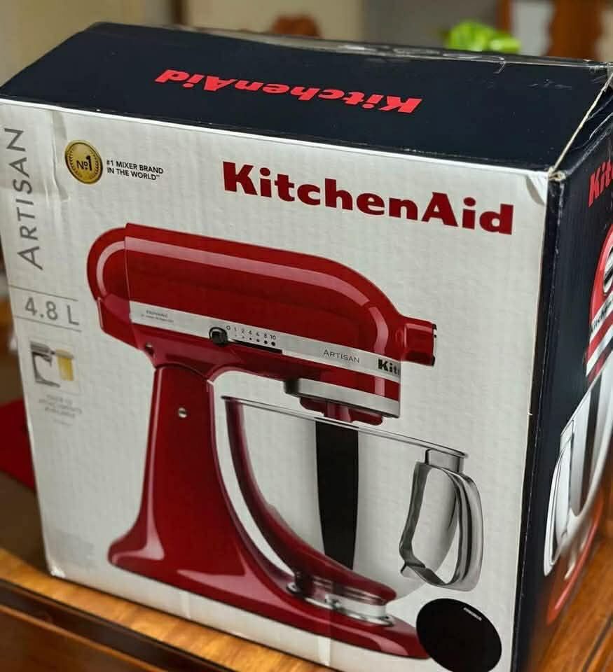KitchenAid Artisan 4.8L Stand Mixer Empire Red (Category: Hand & Stand Mixers) located in Quezon City. Submitted by abarrijennylou155 (Listing ID 1471131529, Image 3). Description: - Iconic KitchenAid Artisan Stand Mixer in a stunning bold red finish - Includes stainless steel bowl with a comfortable handle - Comes complete with wire whip, dough hook, flat beater, and pouring shield - Original box included - Powerful motor featuring multiple spee