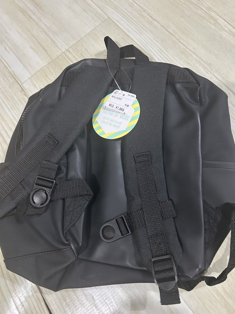 Klart Black Water Resistant Casual Backpack (Category: Babies & Kids Fashion) located in Manila. Submitted by ai010 (Listing ID 1471213613, Image 2). Description: - Brand new Klart black backpack with original Japanese price tag still attached - Smooth matte finish, water-resistant material to keep your belongings safe - Front zippered pocket for quick access to small items - Spacious main compartment with secure double zippers - Adjustable shoul