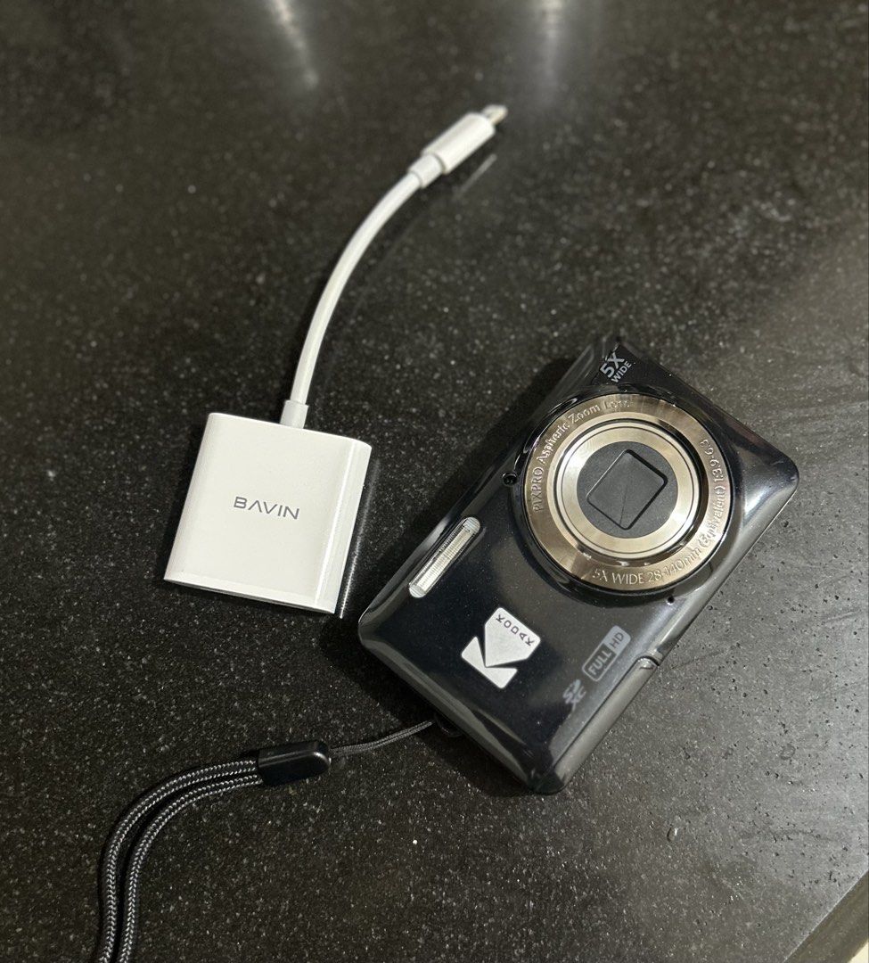 Kodak PixPro Digital Camera with BAVIN Card Reader and Memory Card (Category: Cameras) located in Manila. Submitted by clementine_penguin (Listing ID 1471219668, Image 1). Description: - Model: Kodak PixPro FZ55 Compact Digital Camera (Black) - Features: Full HD video recording and 5X wide zoom lens - Condition: Good as new (6-month old) Clean body, all buttons fully functional - Included: Black wrist strap for secure carrying - Bonus Bundle: BAV