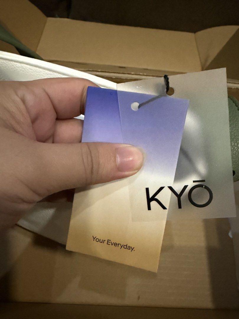 KYŌ White and Green Bucket Bag (Category: Shoulder Bags) located in Cainta. Submitted by madmaaax (Listing ID 1471228114, Image 3). Description: - Brand: KYŌ - Color: White with green shoulder strap and blue inner lining - Closure: Magnetic snap on inner flap - Condition: Brand new with tag still attached - Inclusions: Original branded box included .