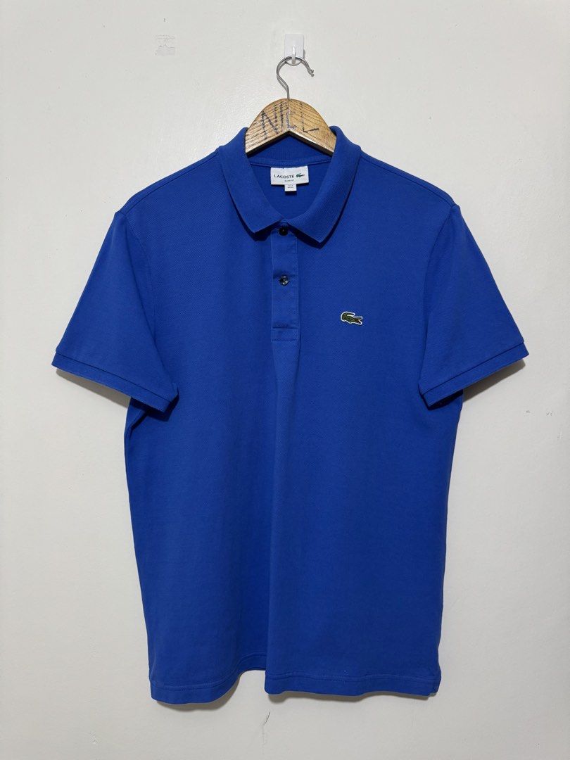 Lacoste Blue Polo Shirt (Category: Tshirts & Polo Shirts ) located in Bacolod City. Submitted by thriftppy_ (Listing ID 1471223198, Image 1). Description: LACOSTE BLUE POLO SHIRT Size: 6 slim-fit Width: 21 Length: 28 Color rate: 9.8/10 Condition: Excellent near new Issue: None 💰1289 DM for sure buyers 📥 Mode of payment:GCASH, BANK TRANSFER Unli vouch and vc for safety transaction. 📌Color may vary due to lighting📸 📦 Shipping via JNT EXPRESS🚚