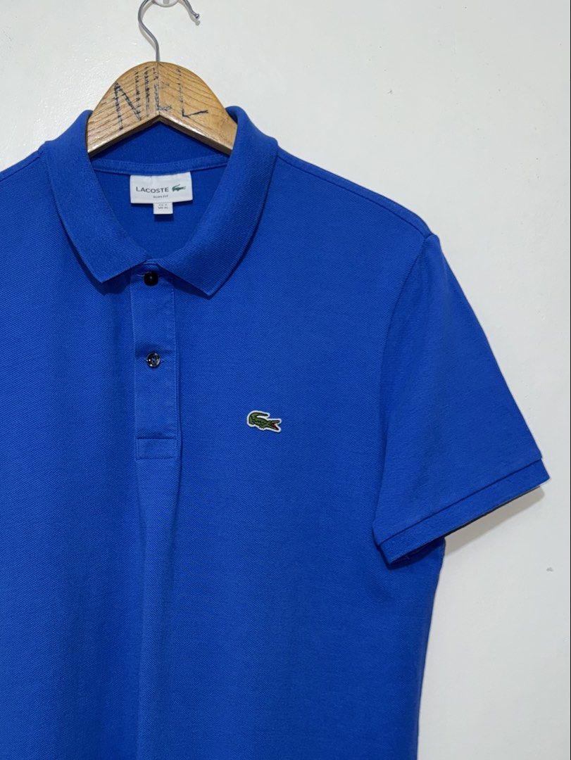 Lacoste Blue Polo Shirt (Category: Tshirts & Polo Shirts ) located in Bacolod City. Submitted by thriftppy_ (Listing ID 1471223198, Image 3). Description: LACOSTE BLUE POLO SHIRT Size: 6 slim-fit Width: 21 Length: 28 Color rate: 9.8/10 Condition: Excellent near new Issue: None 💰1289 DM for sure buyers 📥 Mode of payment:GCASH, BANK TRANSFER Unli vouch and vc for safety transaction. 📌Color may vary due to lighting📸 📦 Shipping via JNT EXPRESS🚚