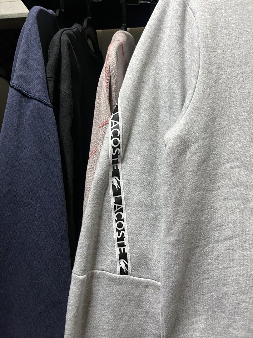 Lacoste Long Sleeve Crewneck Sweater Gray (Category: Coats, Jackets and Outerwear) located in Muntinlupa City. Submitted by ninenine.collective (Listing ID 1471123375, Image 3). Description: Lacoste Long Sleeve Crewneck Sweater Gray - 21/26.
