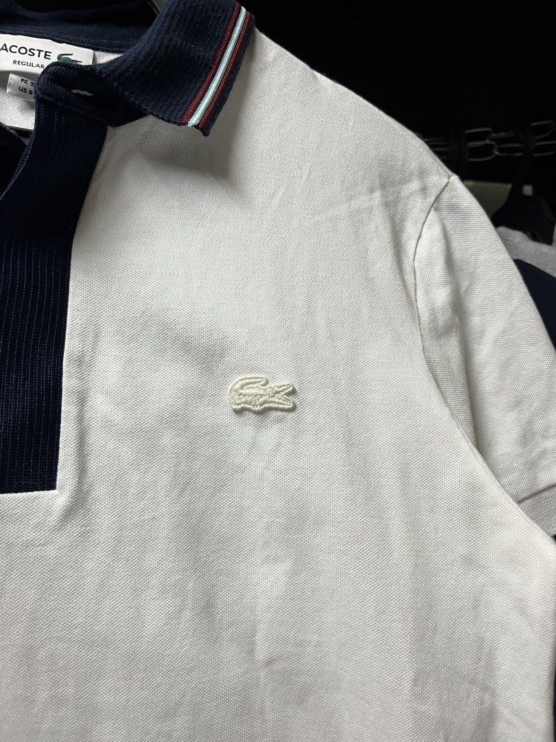 Lacoste Polo Shirt White Navy Collar (Category: Tshirts & Polo Shirts ) located in Muntinlupa City. Submitted by ninenine.collective (Listing ID 1471122824, Image 3). Description: Lacoste Polo Shirt White Navy Collar - 19.5/25.
