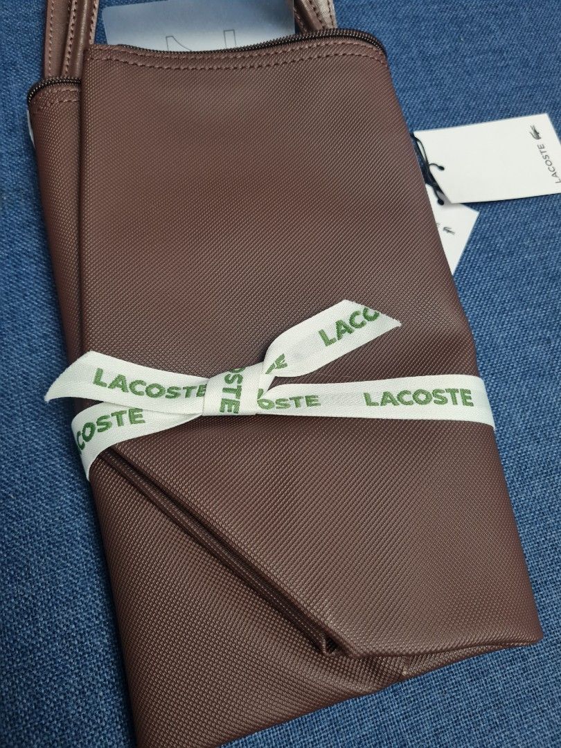 Lacoste tote bag (bundle) (Category: Tote Bags) located in Quezon City. Submitted by luli_18 (Listing ID 1471222897, Image 2). Description: 2 Lacoste tote bags original with gift receipts.