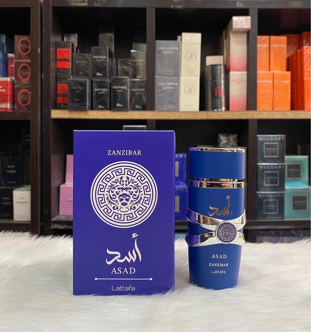 Lattafa Asad Zanzibar Eau De Parfum 100ml (Category: Fragrance & Deodorants) located in Taguig. Submitted by aizonlineshopph (Listing ID 1471207932, Image 1). Description: - Authentic Lattafa Asad Zanzibar Eau de Parfum, 100ml - Fresh woody and aquatic scent profile, ideal for everyday use - Striking vibrant blue packaging with the iconic lion crest motif on box and flacon - Detailed with stylish silver-tone hardware - Brand new, unopened box in 