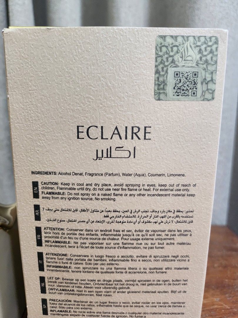 Lattafa Eclaire Eau De Parfum 100ml (Category: Fragrance & Deodorants) located in Mandaluyong City. Submitted by cla_young (Listing ID 1471184312, Image 2). Description: - Authentic Lattafa Eclaire Eau de Parfum - Volume: 100ml / Natural spray vaporizer - Condition: Lightly used, with around 90 mL of juice remaining; box has few folds as seen in the picture - Guaranteed original with security hologram sticker and QR code.