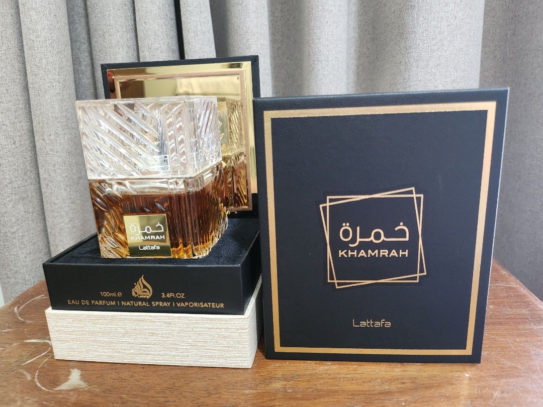 Lattafa Khamrah Eau De Parfum 100ml (Category: Fragrance & Deodorants) located in Mandaluyong City. Submitted by cla_young (Listing ID 1471183233, Image 1). Description: - Brand: Lattafa Khamrah - Size: 100ml Eau de Parfum - Condition: Lightly used (see pic for juice level), complete with original box - Authenticity: Includes official QR code sticker on packaging .